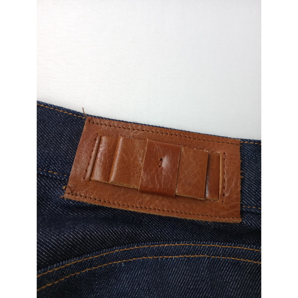 R&D.M.Co- オールドマンズテーラー デニムパンツ ボウタイレザーパッチ ネイビー 【中古】
