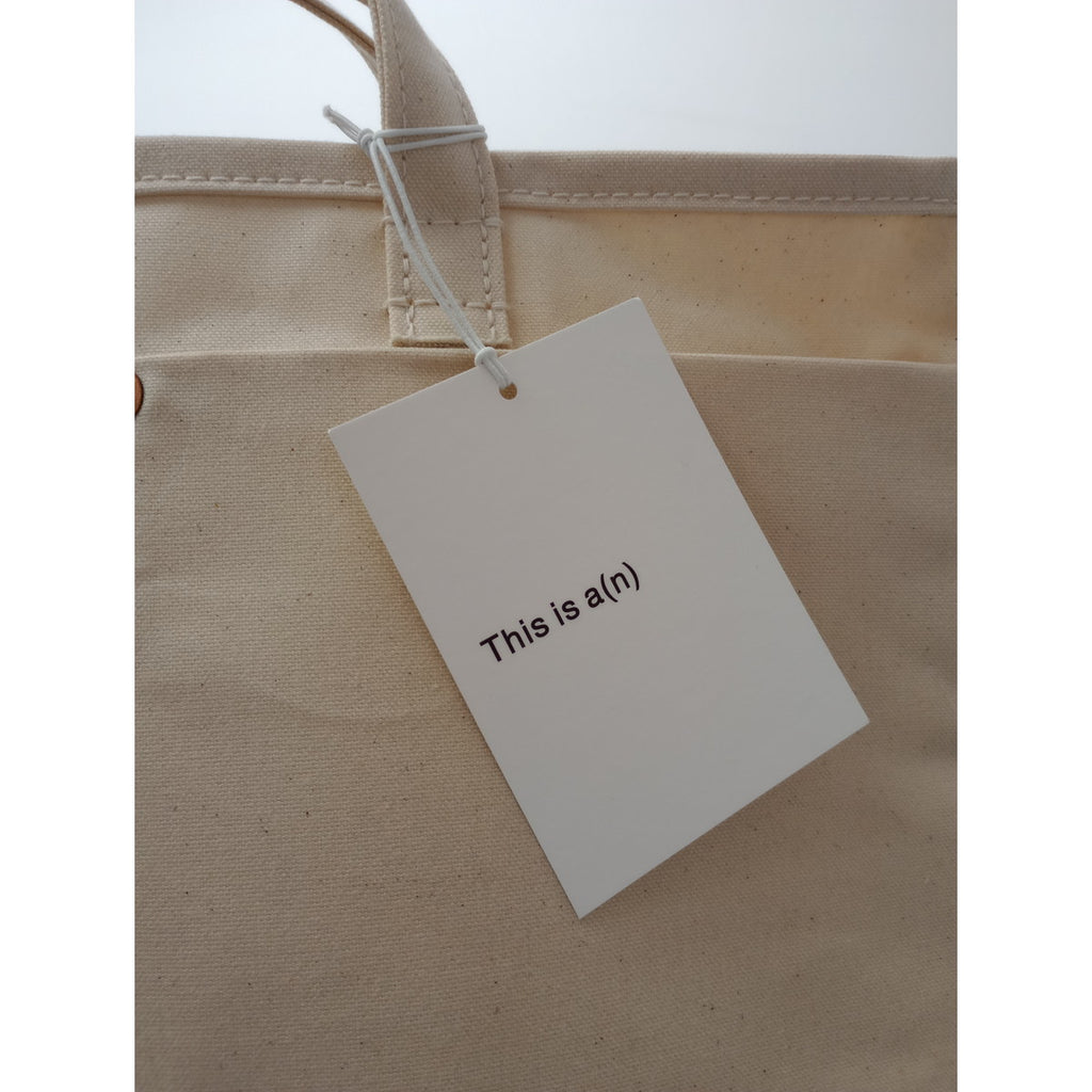 新品 This is a(n) ディスイズア Base Tote S キャンバス トートバッグ 生成り